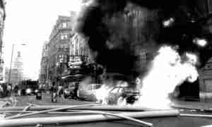 Poll Tax riots in London theatreland cars exploding