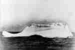 Iceberg, presumed to be the one that was struck by the RMS Titanic, is pictured from the deck of the cable ship Mackay-Bennett on April 15, 1912