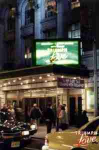 Triumph of Love Broadway theatre exterior under marquee