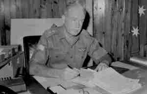 Max Simkin in VUNG TAU SOUTH VIETNAM. 1970 04. THE COMMANDER OF THE 1ST AUSTRALIAN LOGISTIC SUPPORT GROUP 1ALSG COLONEL M. B. SIMKIN OF RED HILL ACT AT HIS DESK