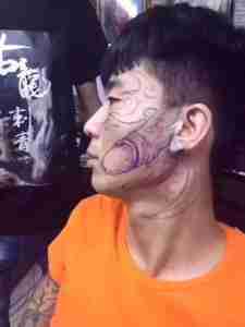 Funny China Chinese penis face tattoo